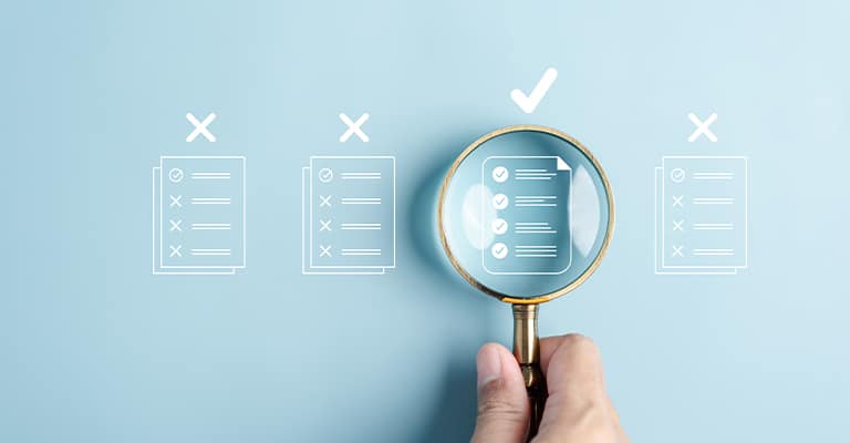 OffPageSEO_2 • Andrew Roche SEO A hand holds a magnifying glass over one of four checklist icons, highlighting the only one marked with a checkmark while the others have Xs above them. The image represents selecting the correct or best option after careful review or evaluation.